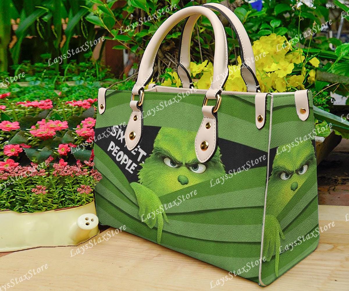 Discover Personalized funny character Christmas Leather Handbag, funny character Women Bags