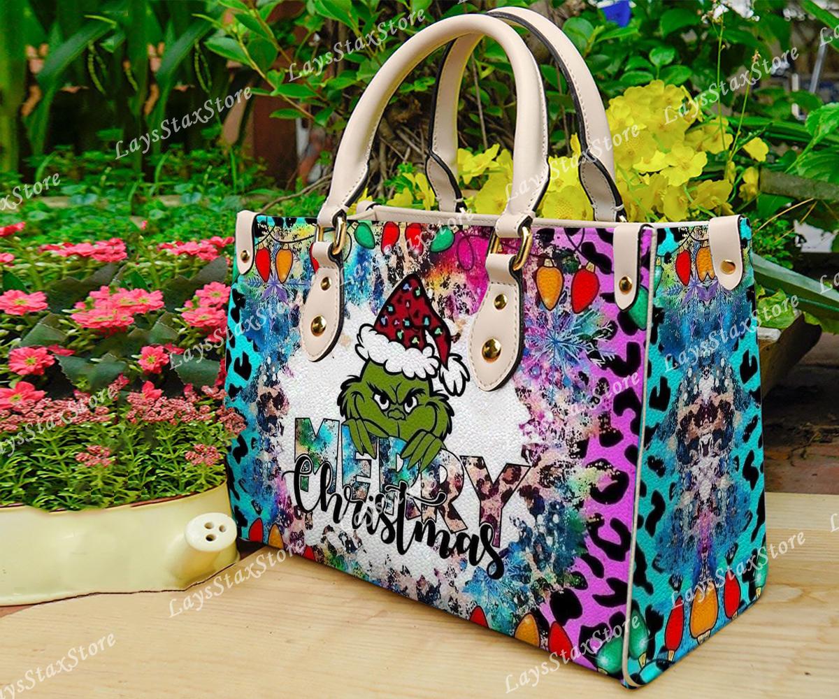 Discover Personalized funny character Christmas Leather Handbag, funny character Women Bags