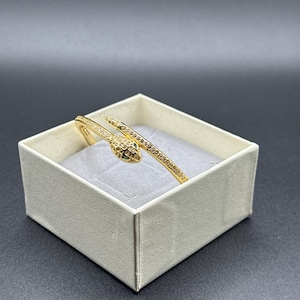 Elegant Gold coloured Snake Bracelet with Crystal Accents –Luxury Bangle in a Gift Box