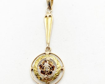 Colgante de solapa Art Déco victoriano de oro con diamantes