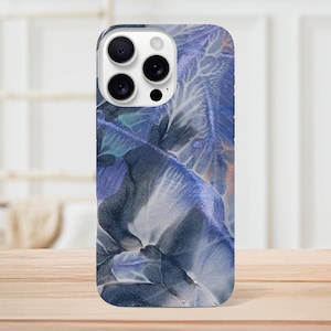 May include: A smartphone case with a blue and white abstract design. The case features a swirling pattern with shades of blue, white, and hints of orange. The case has a glossy finish and a camera cutout.