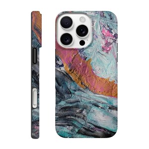 May include: A phone case with an abstract design. The case features a colorful, textured pattern with shades of pink, gold, teal, and black. The side view shows the case's thickness and button placement. The case has a glossy finish.