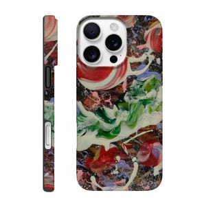 May include: A phone case with an abstract art design. The case features a colorful pattern of red, white, green, and pink paint splatters on a black background. The side of the case is black with a white button and a camera cutout.