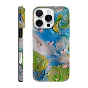 May include: A colorful phone case with an abstract painted design. The case features a mix of blue, green, yellow, and pink hues, creating a textured, artistic appearance. The side view shows the case's profile, highlighting its protective design.