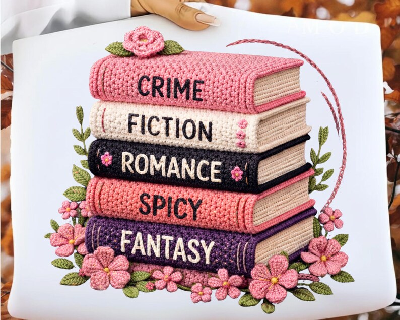 May include: A stack of five crocheted books with the words "CRIME", "FICTION", "ROMANCE", "SPICY", and "FANTASY" on the spines. The books are in shades of pink, cream, black, and purple, adorned with flowers and leaves.