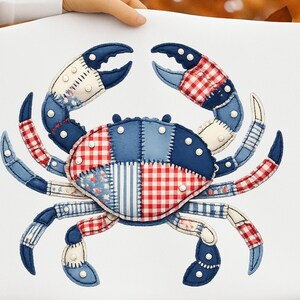 May include: A nautical-themed crab design with patchwork patterns in red, white, and blue. The crab's body and claws feature gingham, floral, and striped fabrics. The design is on a white background.