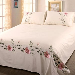 Elegant White Bedsheet Set with Pink Floral Embroidery –Queen Size.