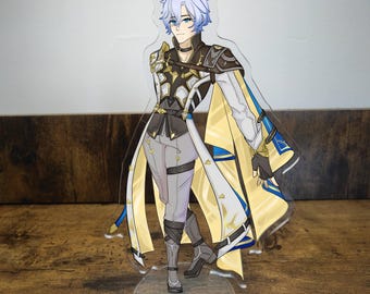 May include: A clear acrylic stand-up figure of a character with light blue hair, wearing a yellow and white cape with blue accents. The character is dressed in a black and gray outfit with gray pants and black boots. The figure is standing on a clear circular base.