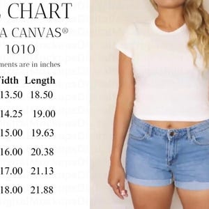 May include: A white crew neck t-shirt and denim shorts are shown. A size chart with measurements in inches is displayed on the left. The chart includes sizes XS to 2XL, with width and length measurements for each size.