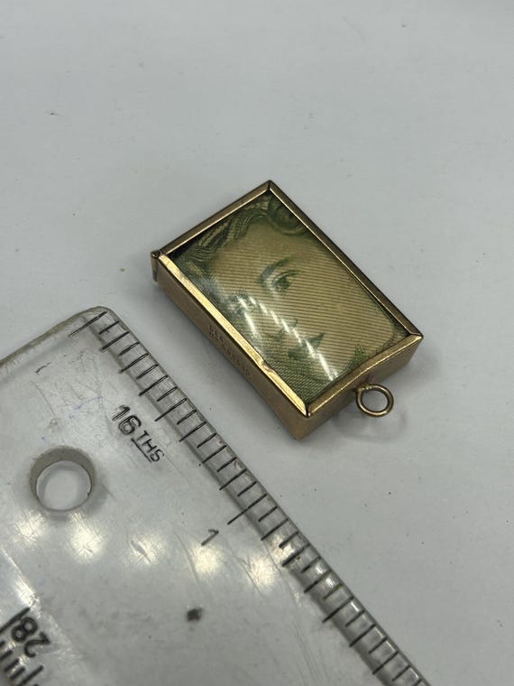 9ct gold One Pound Note - “emergency break glass”