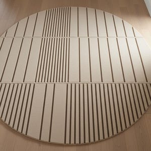 May include: A round rug with a geometric design. The rug features a beige background with vertical brown stripes arranged in a pattern. The rug is approximately 72 inches in diameter, suitable for a living room or bedroom.