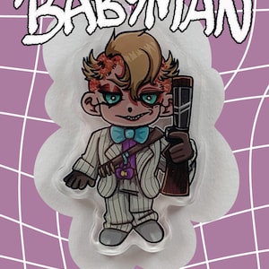 May include: A cartoon-style Babyman character with a shotgun, wearing a pinstripe suit, bow tie, and holding a rifle. The character has red and brown hair, green eyes, and a sinister expression. The image has a white cloud-shaped border and a purple grid background.