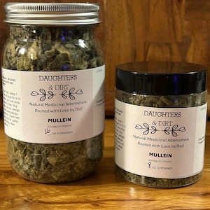 May include: Two glass jars filled with dried green herbs, labeled "Daughters & Dirt" and "Mullein." The larger jar is a 16 oz container, and the smaller is an 8 oz container. The labels also state "Natural Medicinal Alternatives Rooted with Love by Dad."