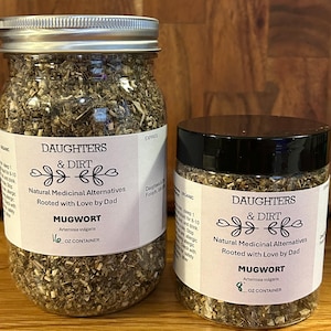 May include: Two glass jars filled with dried herbs, labeled "Mugwort" and "Daughters & Dirt." The larger jar is a 16 oz container, and the smaller is an 8 oz container. The labels include the text "Natural Medicinal Alternatives Rooted with Love by Dad."