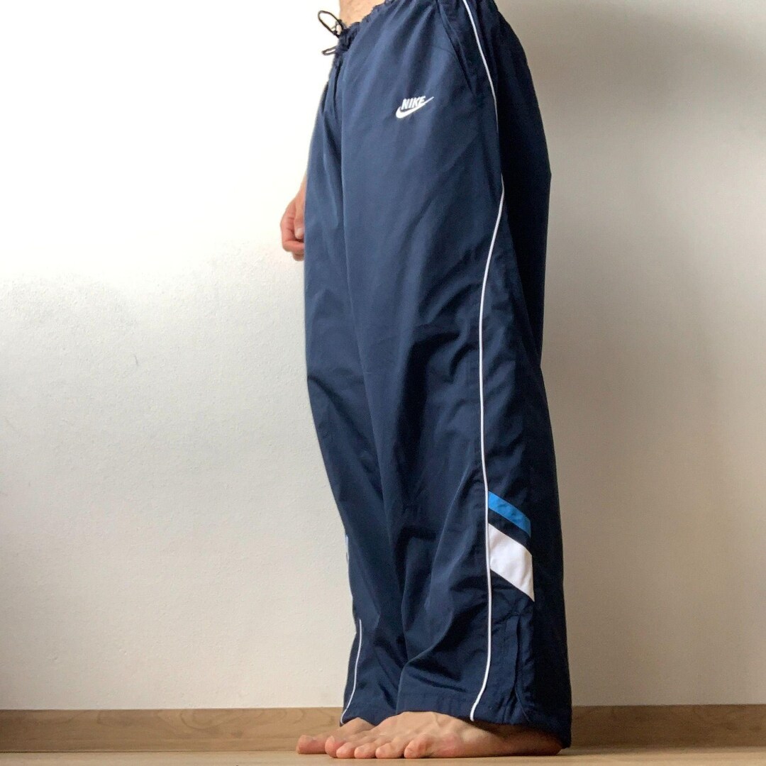 NIKE トラック パンツ XLサイズ ナイキ ストライプ トラックパンツ メンズ XLサイズ ネイビーブルー