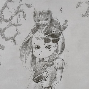 May include: A set of three ceramic mugs with a speckled, matte finish. The mugs are in cream, light grey, and dark grey. Each mug has a simple, minimalist design, ideal for coffee or tea.