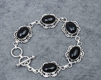 Ovales Armband aus schwarzem Onyx und Neusilber, verziert mit einem floralen Rand und Edelsteinen, handgefertigtes Gliederarmband im Boho-Vintage-Stil für Damen