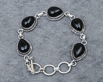 Tropfenförmiges Armband aus Neusilber mit schwarzem Onyx