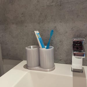 Toothbrush holders