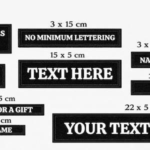 May include: Black rectangular patches with white text, various sizes. Text includes "CUSTOM SIZES ANY TEXT", "NO MINIMUM LETTERING", "TEXT HERE", "NAME", "PERFECT FOR A GIFT", "YOUR NAME", and "YOUR TEXT HERE". Measurements are in centimetres.