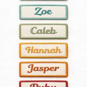 May include: Embroidered name patches in a vertical arrangement. Each patch features a different name: Ryan, Zoe, Caleb, Hannah, Jasper, and Ruby. The names are in a cursive font, with each name in a different color.