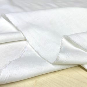 Tela de lino 100 % blanco roto para vestidos, faldas, costura DIY y textiles para el hogar (150 cm de ancho)