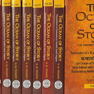 May include: A collection of hardcover books titled "The Ocean of Story" by C.H. Tawney, with translations of Somadeva's Katha Sarit Sagara. The spines are brown with gold lettering, and the cover of Vol. I is a warm orange.