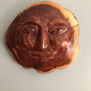 red cedar sun mask one of a kind hand carved