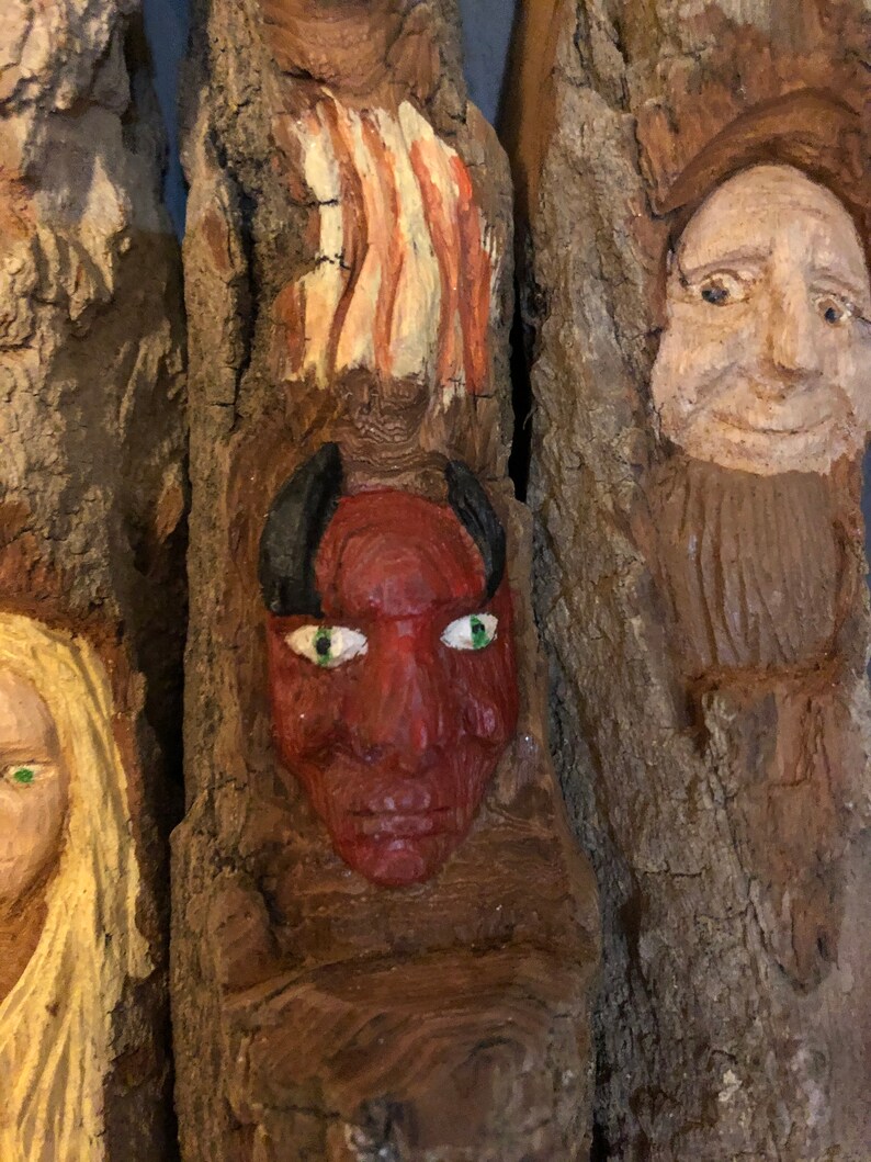 cottonwood bark faces study hand carved