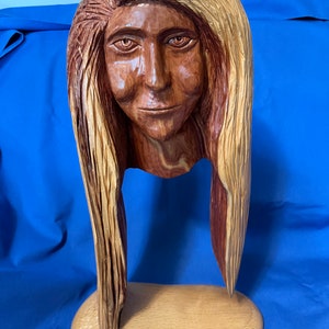 woman wood spirit face in cedar