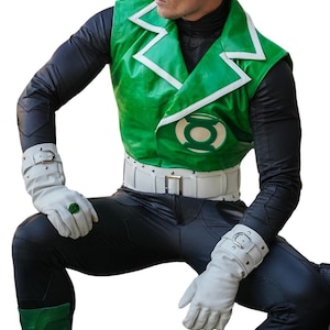 May include: Green vest with white trim and a circular emblem, paired with a white belt and gloves. The costume features black pants and sleeves. A green ring is visible on the hand. The overall theme is a superhero costume.