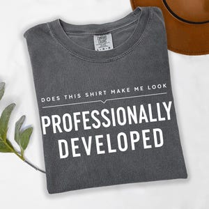 Does This Shirt Make Me Look Professionally Developed Shirt, Funny Office Humor Tee, Corporate Coworker Gift, Unisex Work T-Shirt