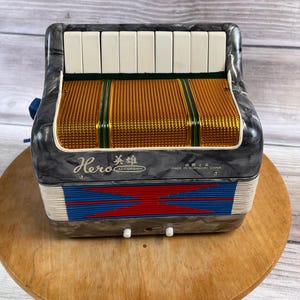 Hero Accordion - Etsy