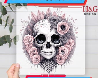 May include: DTF transfer featuring a skull with a floral wreath of pink and gray roses. The skull has large, dark eye sockets and a detailed skeletal structure. The words "DTF TRANSFER" and "Ready To Press" are displayed in the image.