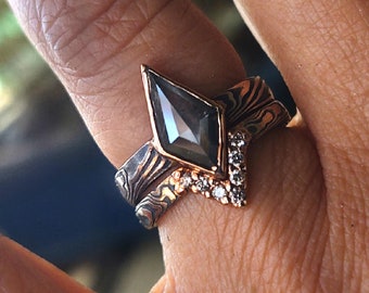 Kite engagement ring unique Mokume Gane black diamond with diamond band