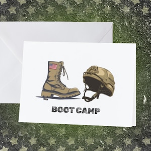 May include: Greeting card with a military theme. The card features a tan combat boot with an American flag and a tan helmet. The words "BOOT CAMP" are printed in a bold, dark font below the images. An envelope is behind the card.