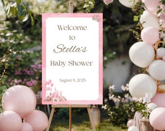 Puede incluir: Un letrero de bienvenida rosa y blanco para baby shower sobre un caballete. El letrero dice "Bienvenida a la baby shower de Stella" con la fecha 9 de agosto de 2025. El letrero tiene un borde rosa y un castillo.