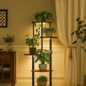 May include: A multi-tiered plant stand with built-in LED lights. The stand features dark wood shelves and a black metal frame, displaying various potted plants. The background includes a wooden cabinet, a curtain, and a wall with decorative molding.