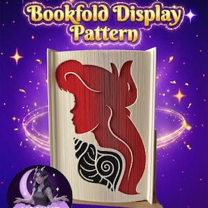 May include: A bookfold display pattern with a red silhouette of a woman's profile and a black seashell design. The text "Bookfold Display Pattern" is in gold. The background is purple with stars and sparkles.