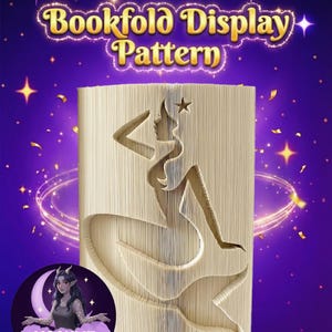 May include: A bookfold display pattern featuring a mermaid design cut into the pages. The text "Bookfold Display Pattern" is displayed at the top. The background is purple with stars and a swirling light effect.