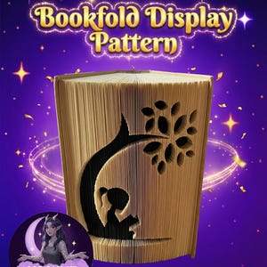 May include: A bookfold display pattern with a tree and girl silhouette cut into the pages. The text "Bookfold Display Pattern" is displayed in gold lettering. The background is purple with stars and a crescent moon.