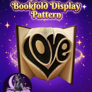 May include: An open book with the word "love" folded into a heart shape from the pages. The words "Bookfold Display Pattern" are displayed above. The background is purple with gold stars and accents.