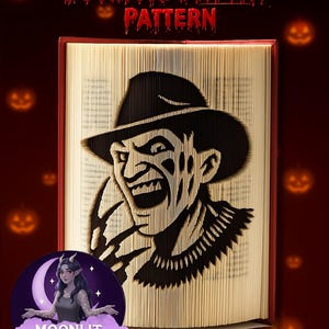 May include: A bookfold display pattern featuring a black and white image of a horror movie character. The text "Bookfold DISPLAY PATTERN" is in red. The image includes a logo with a woman and the text "MOONLIT MUNCHKIN CREATIONS".