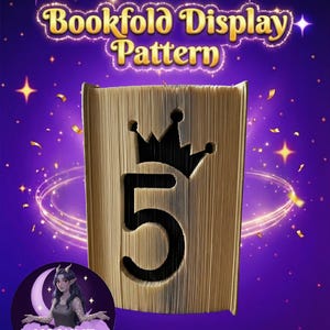 May include: A bookfold display pattern with the text "Bookfold Display Pattern" in gold lettering. The book is carved with a crown and the number 5. The background is purple with stars and a crescent moon with a woman.
