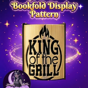 May include: A gold-colored bookfold display pattern with the text "Bookfold Display Pattern" at the top. The book is carved with the words "KING of the GRILL" and a flame design. The background is purple with stars and confetti.