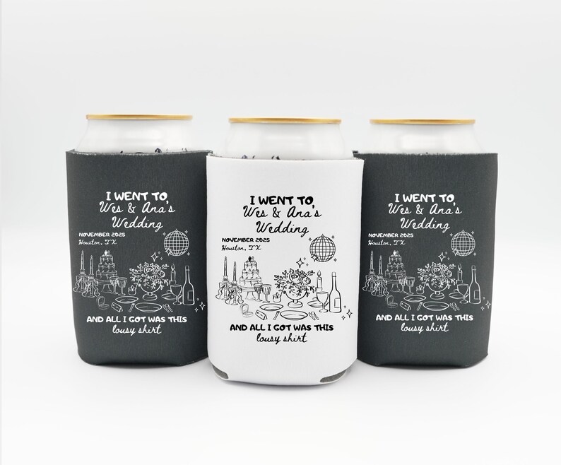 May include: Three beverage can coolers, two in dark gray and one in white. Each cooler features the text "I WENT TO Wes & Ana's Wedding" with event details and a humorous phrase. The design includes illustrations of wedding elements.