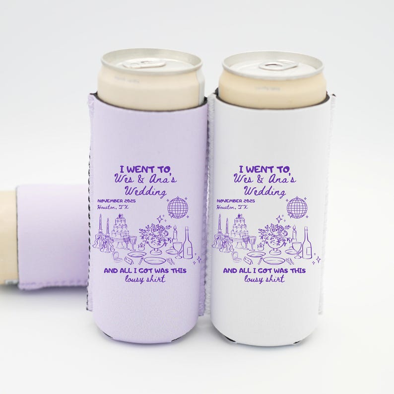 May include: Two slim can coolers, one lavender and one white, each holding a can. The coolers feature a wedding-themed design with text that reads "I went to Wes & Ana's Wedding" and "And all I got was this lousy shirt."