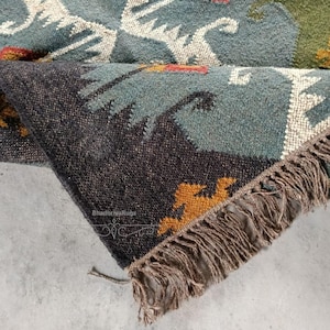 Handmade Kilim Rug
Wool Jute Rug
Bohemian Rug
Home Decor Rug
Multicolor Kilim Rug
Turkish Kilim Rug
Flatweave Rug
Eco friendly Rug
Doormat Rug
Navajo Rug
Outdoor Indoor Rug
Modern Kilim Rug
chunky Wool Jute Rug
