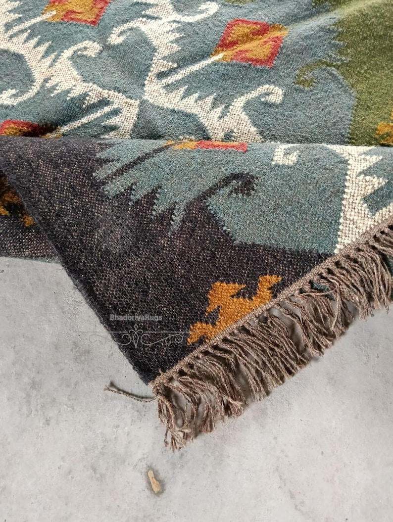 Handmade Kilim Rug
Wool Jute Rug
Bohemian Rug
Home Decor Rug
Multicolor Kilim Rug
Turkish Kilim Rug
Flatweave Rug
Eco friendly Rug
Doormat Rug
Navajo Rug
Outdoor Indoor Rug
Modern Kilim Rug
chunky Wool Jute Rug