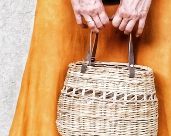 Woven natural hand bag